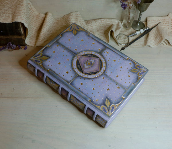 Purple leather journal with gold decoration, The Eye of the Universe