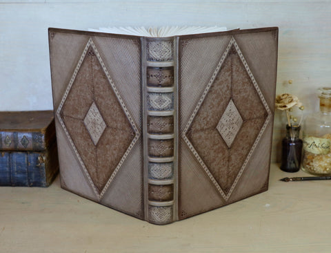 Brown leather journal with blind tooled decoration, Monochrome Textures