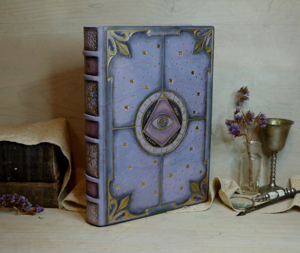 Purple leather journal with gold decoration, The Eye of the Universe