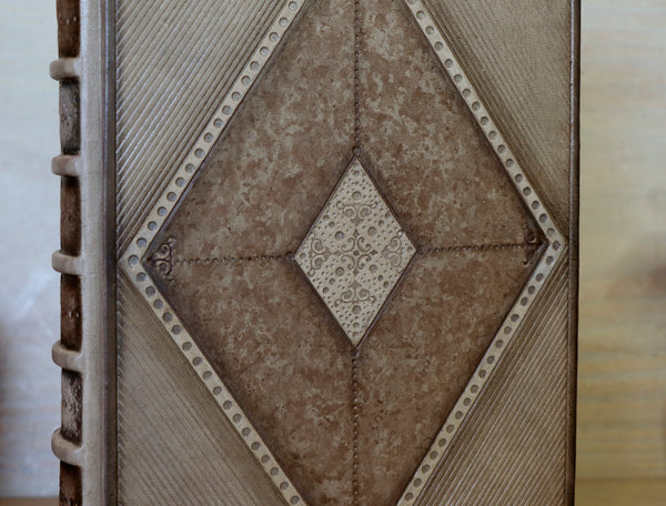 Brown leather journal with blind tooled decoration, Monochrome Textures