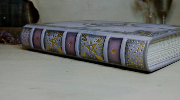 Purple leather journal with gold decoration, The Eye of the Universe