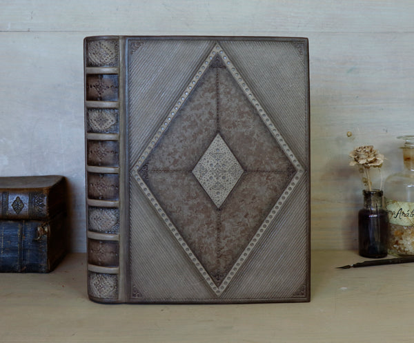 Brown leather journal with blind tooled decoration, Monochrome Textures