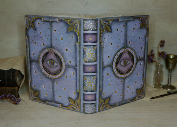 Purple leather journal with gold decoration, The Eye of the Universe