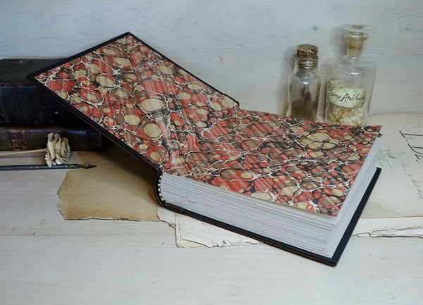 Large leather journal, Worn leather, Gold tooled decoration. The Old Book