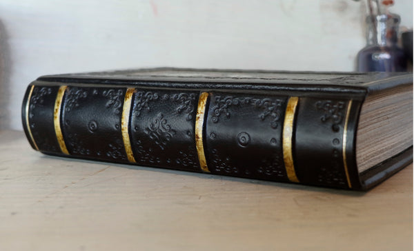 Black leather journal with painted Illuminated miniature and gold tooled decoration - Medieval Whale